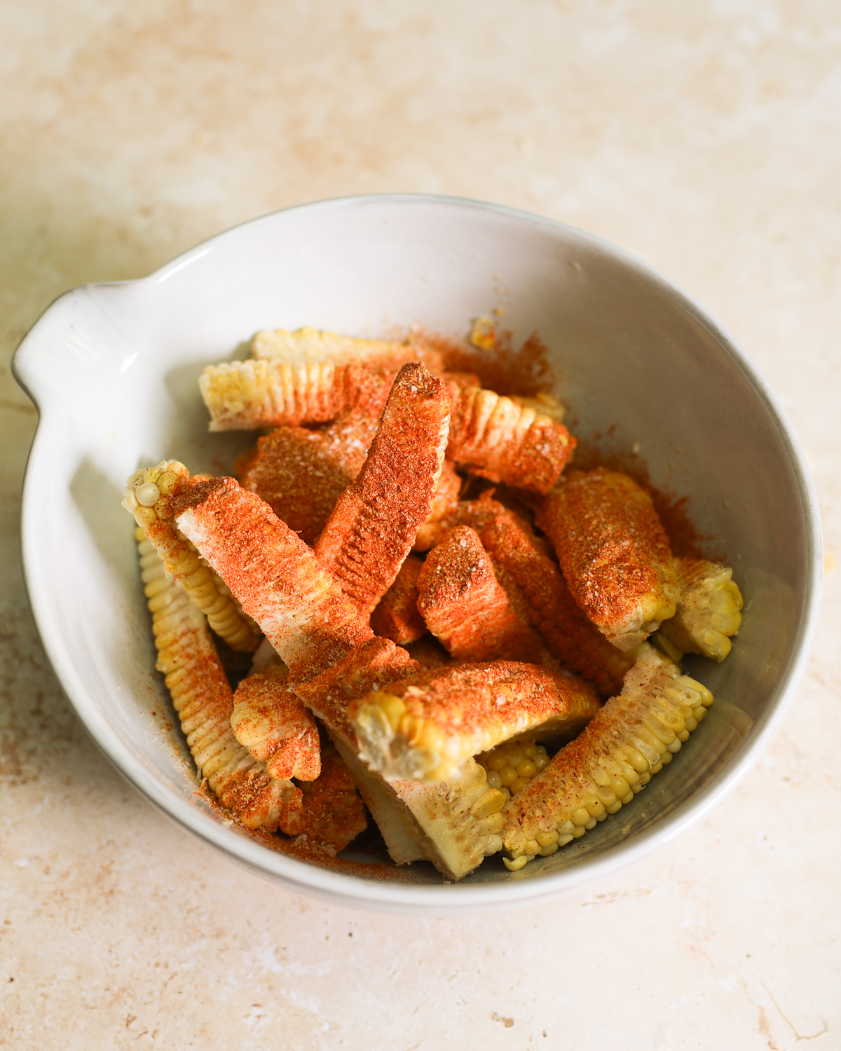 overhead of spices added to corn