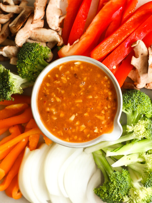 Stir Fry Sauce in bowl surrounded by veggies