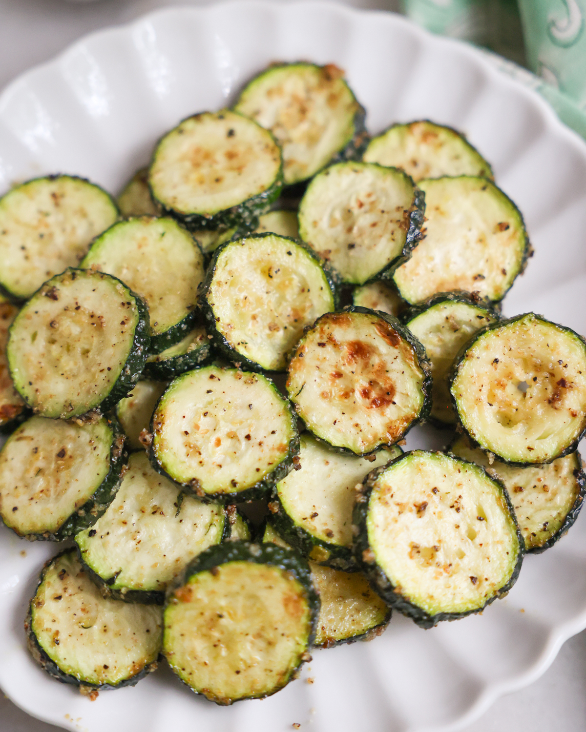 A close-up shot of a plate of air fryer zucchini.