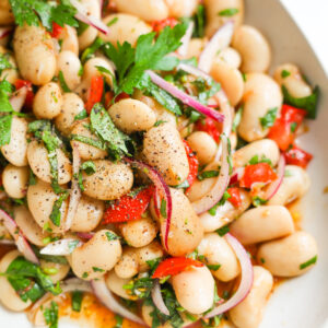 close up of marinated white bean salad