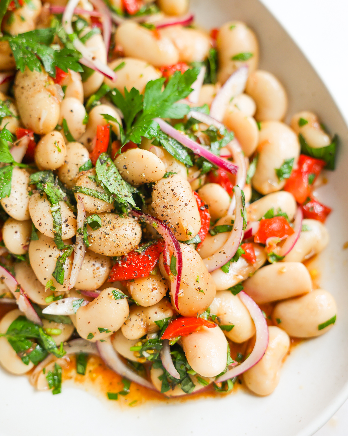 close up of marinated white bean salad