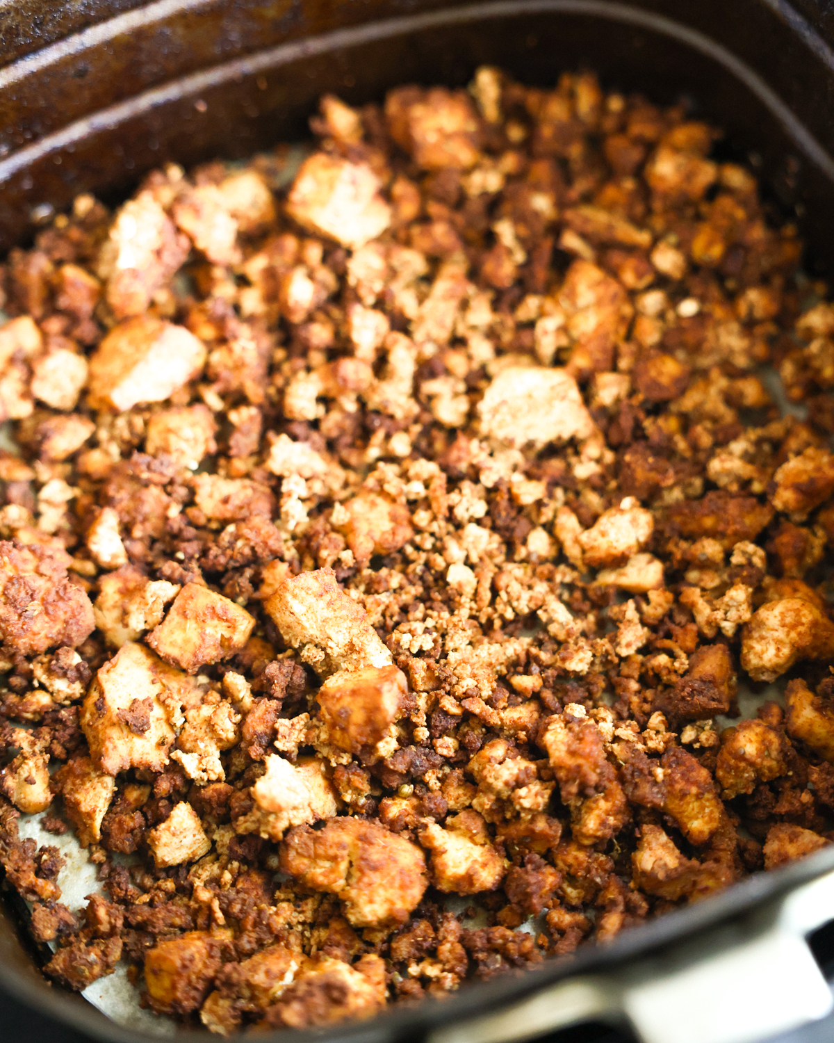 close up of tofu in air fryer