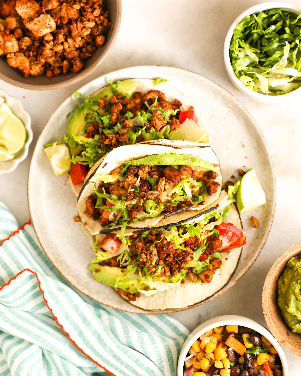 overhead of tofu tacos on plate