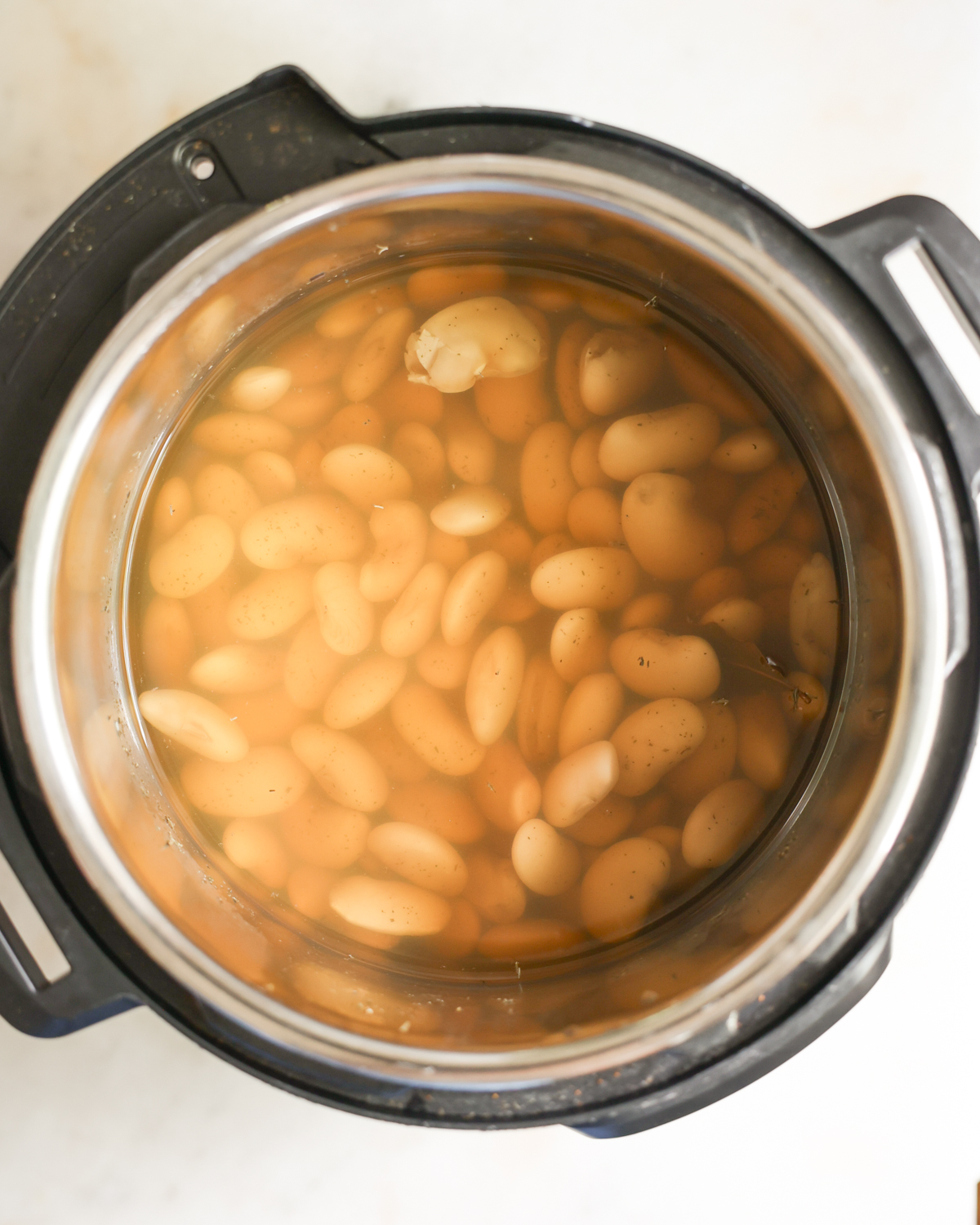 overhead of cooked beans in instant pot