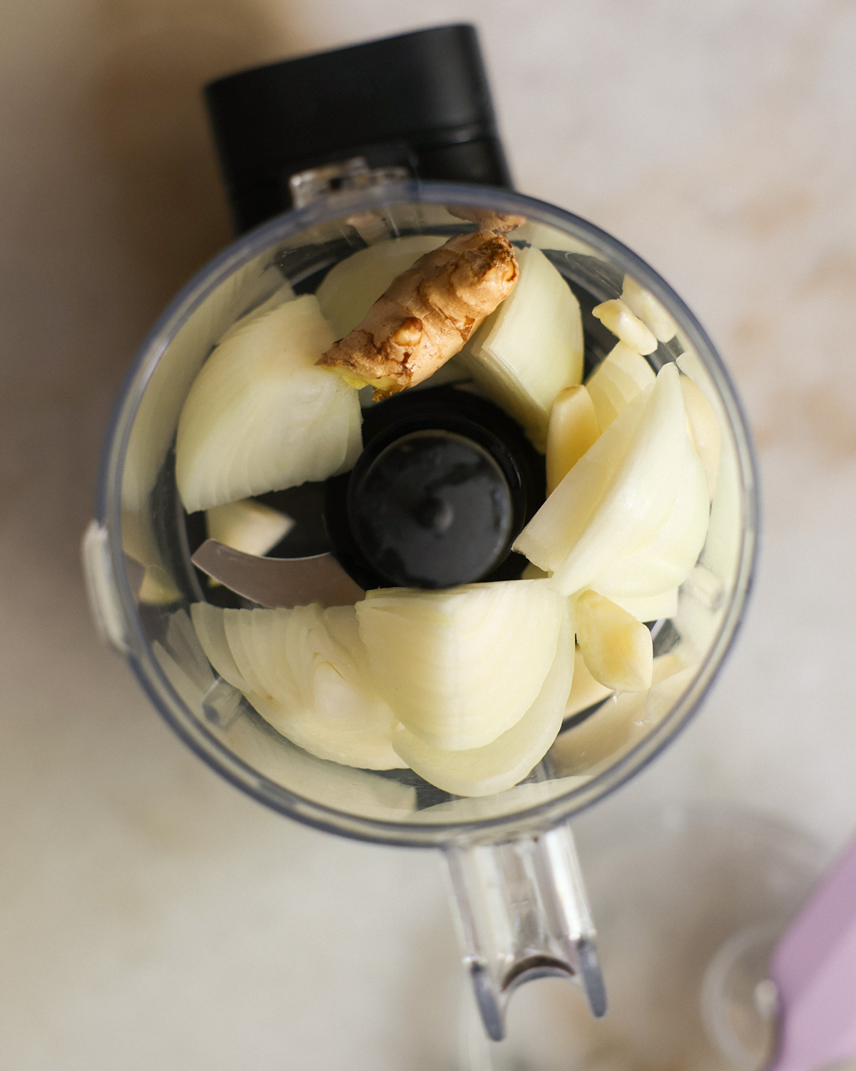 onions in food processor, overhead