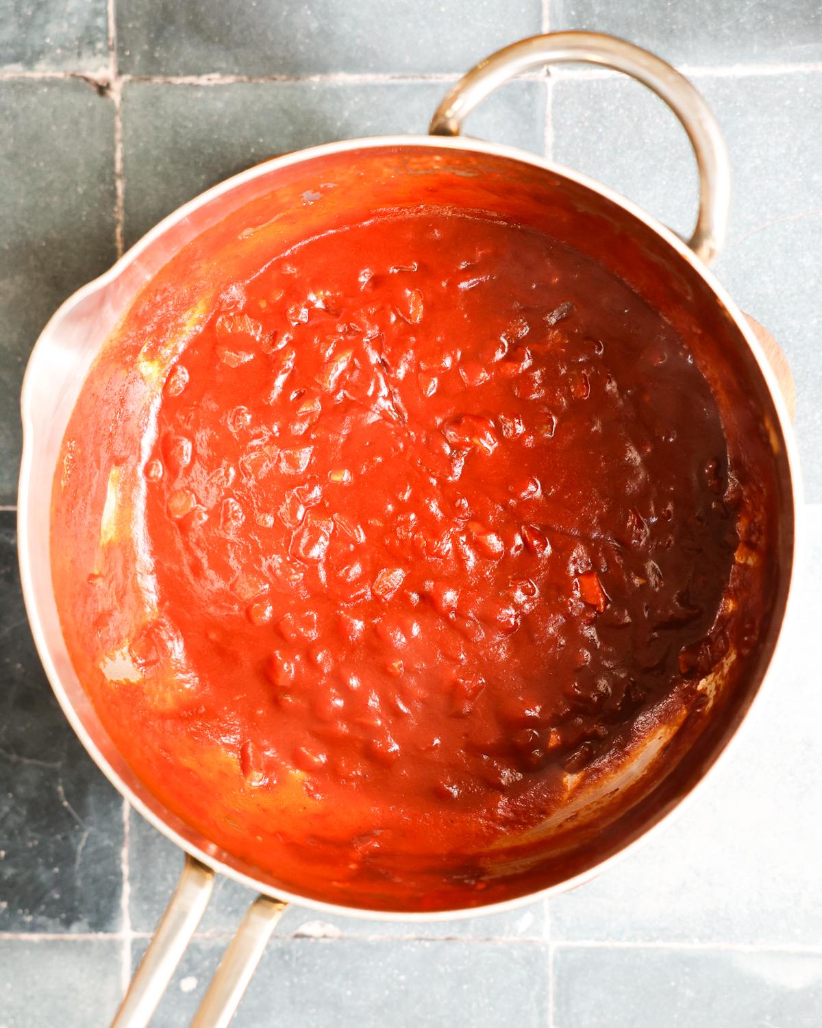 A pan of the simmered vegan BBQ sauce before blending.