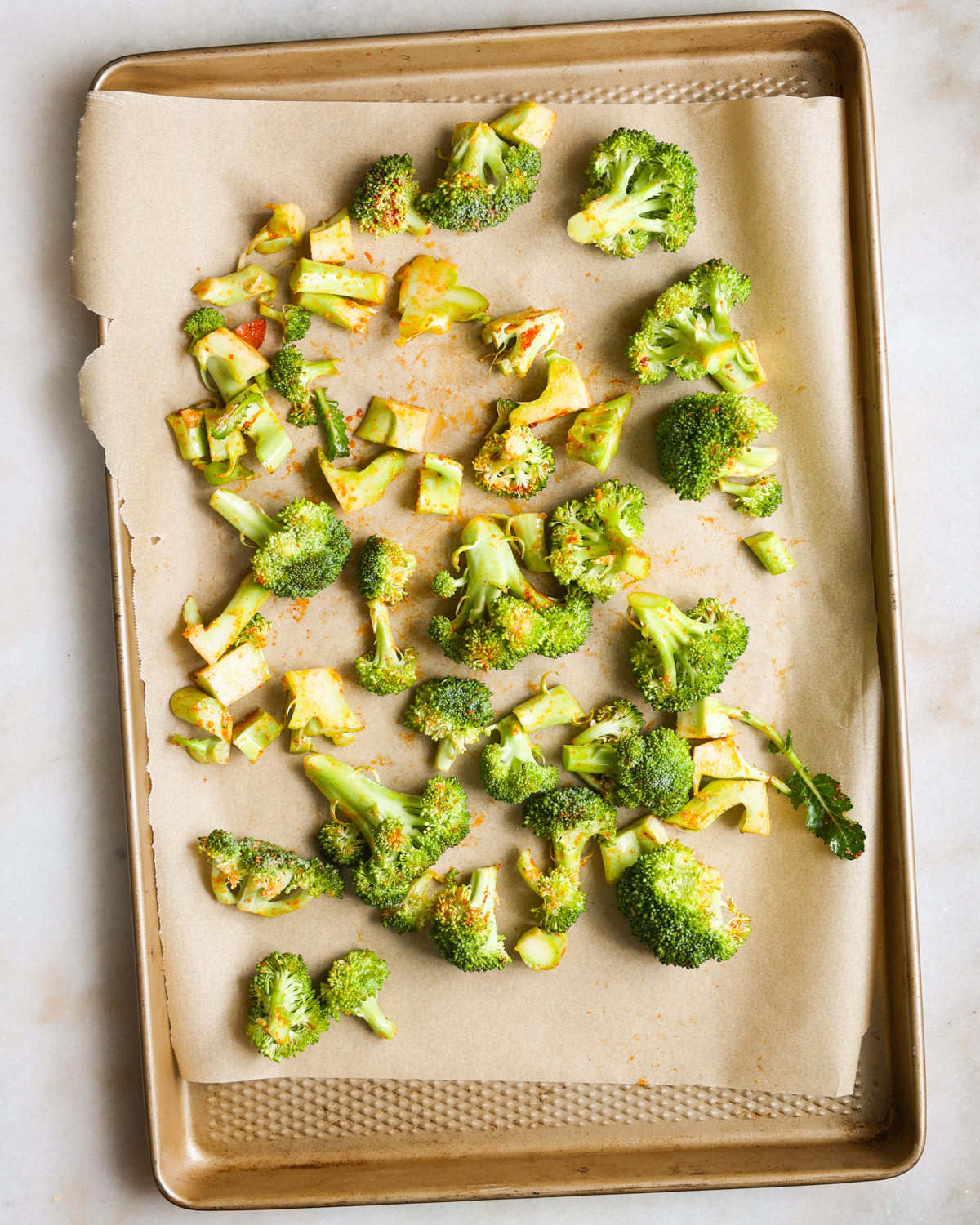 overhead broccoli on baking sheet