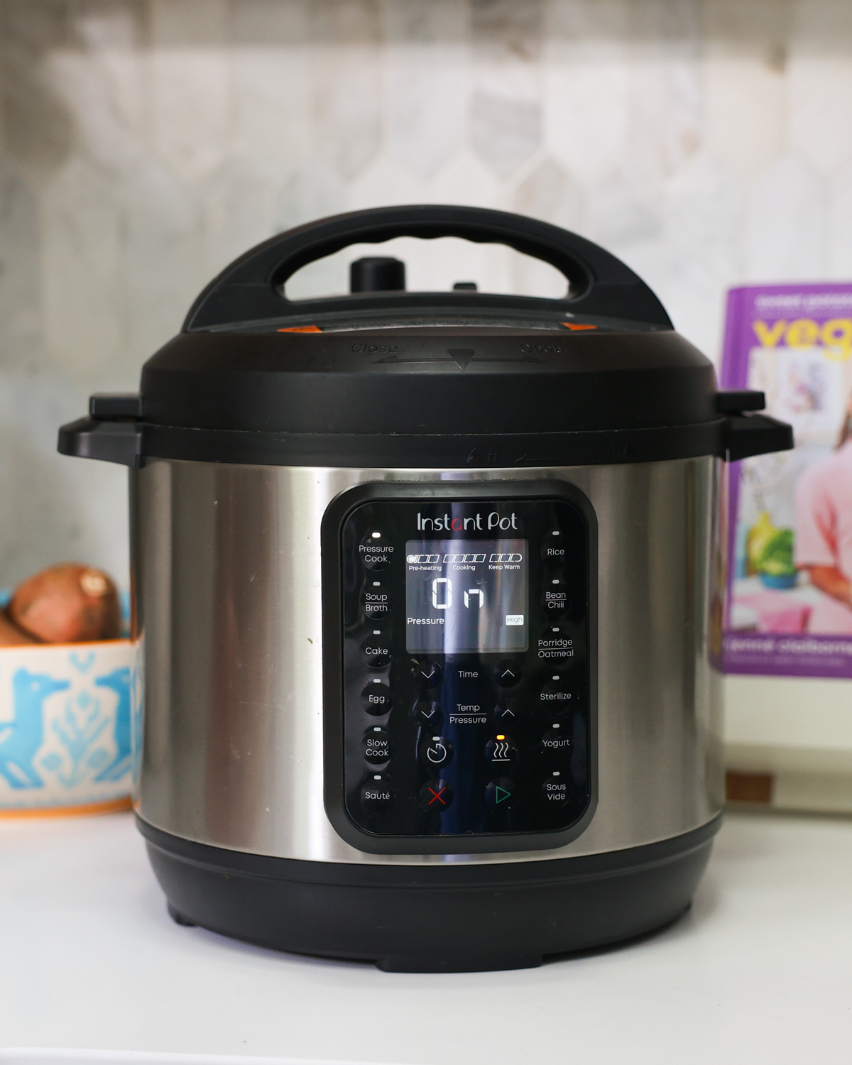 instant pot electric pressure cooker on counter