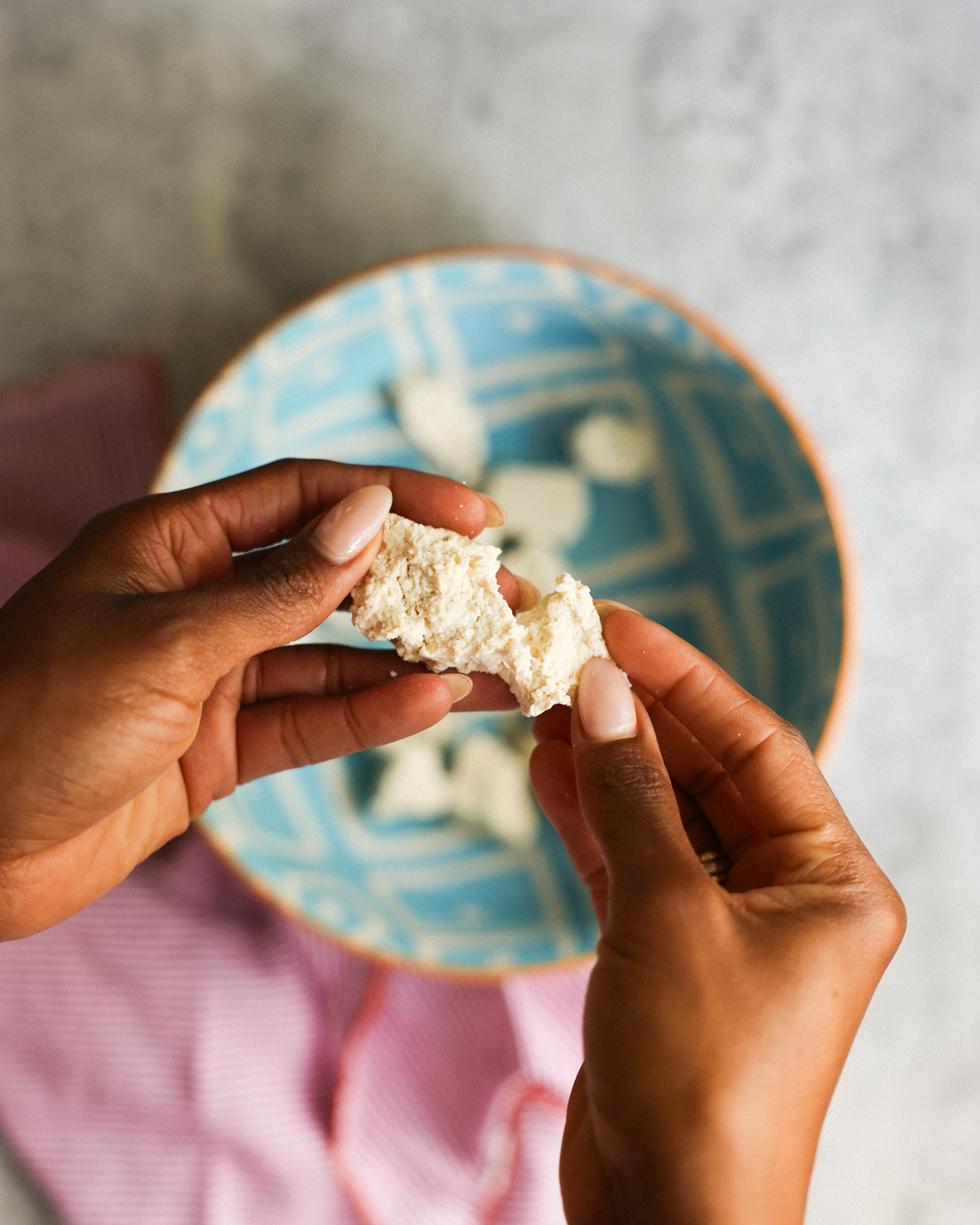 pulling apart tofu for nuggets
