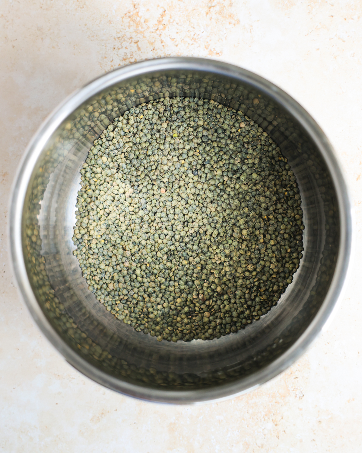 overhead raw lentils in bowl