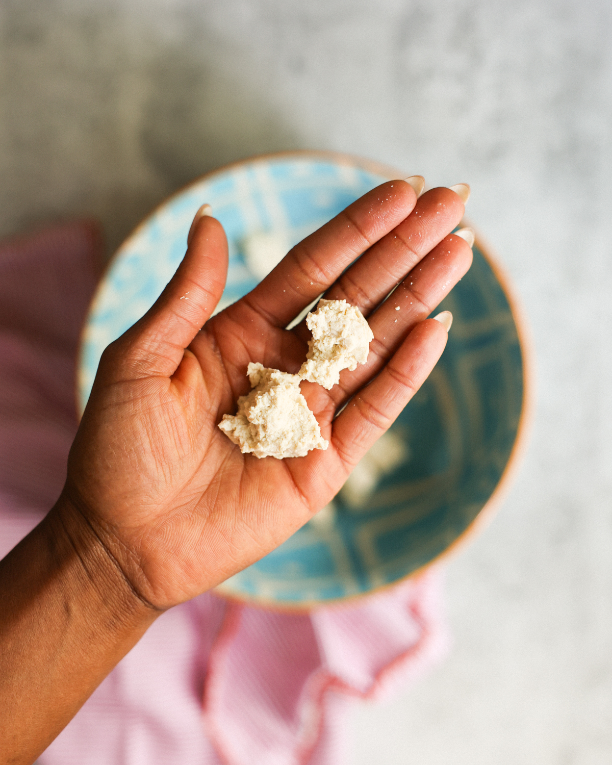 tofu chunks in hand