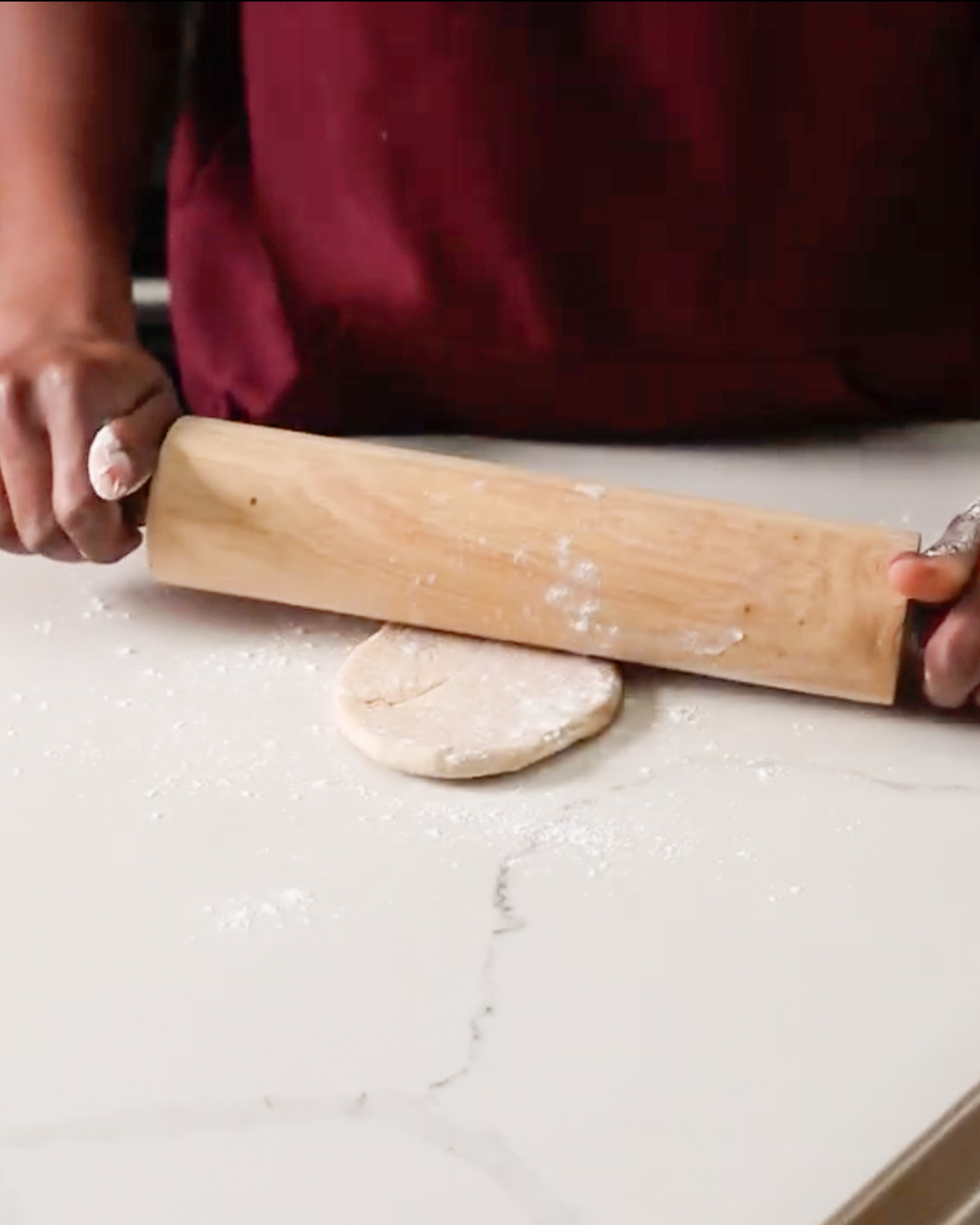 rolling naan dough flat