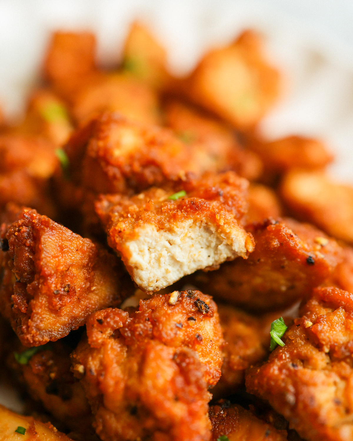 close up tofu nugget with bite missing