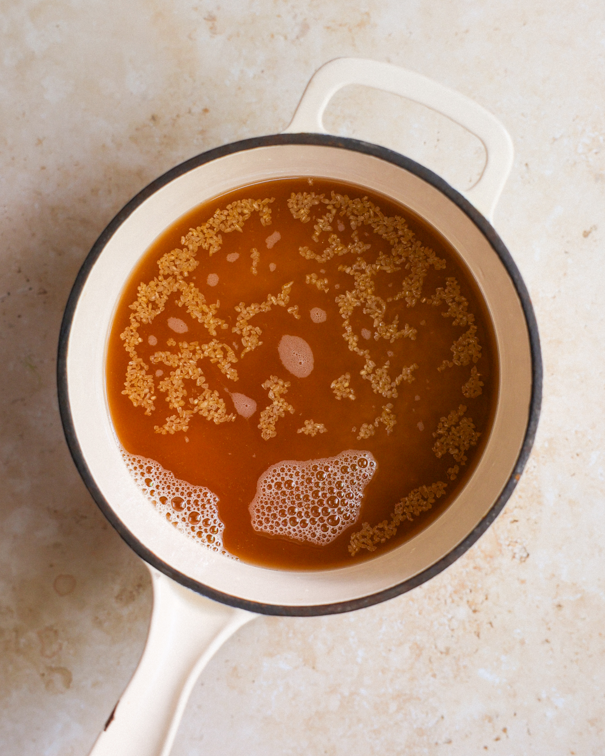 bulgur in pot with broth