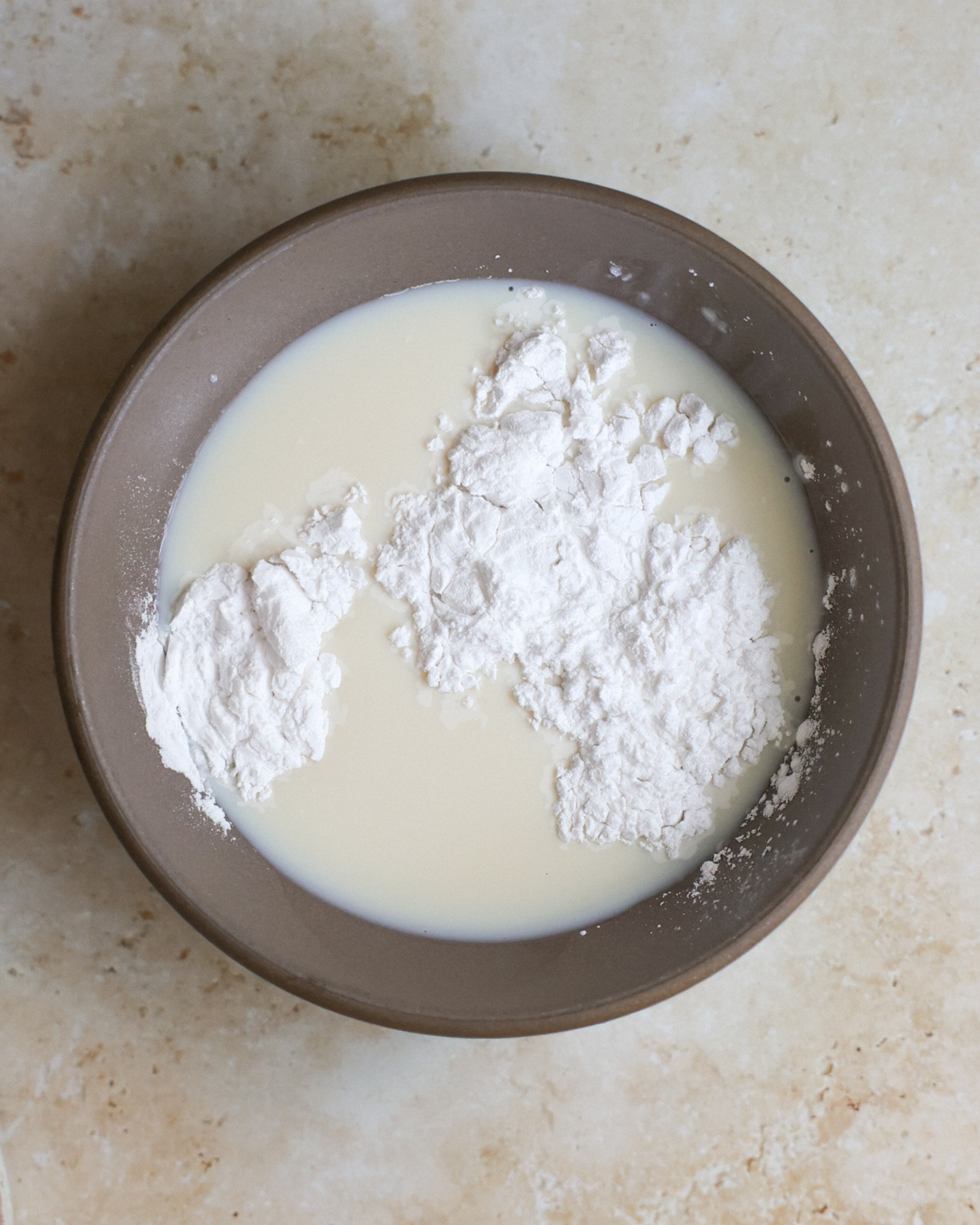 overhead arrowroot powder in milk