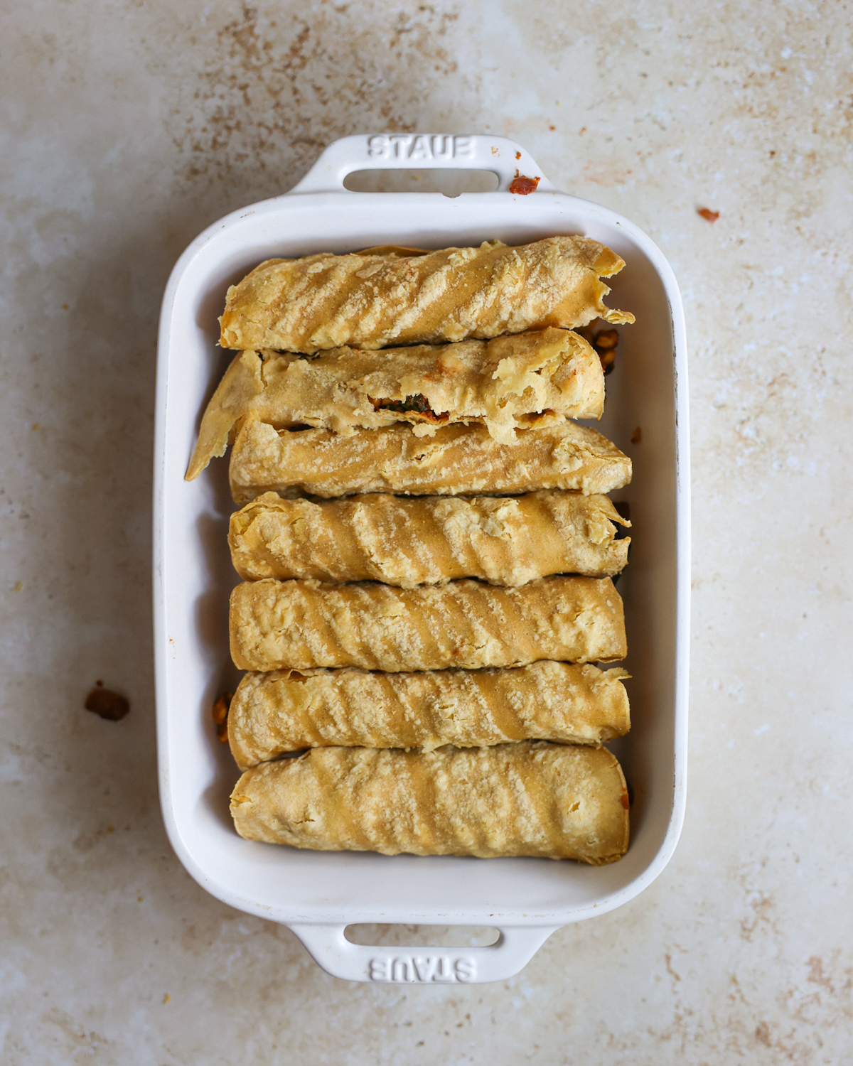 filled enchiladas in pan