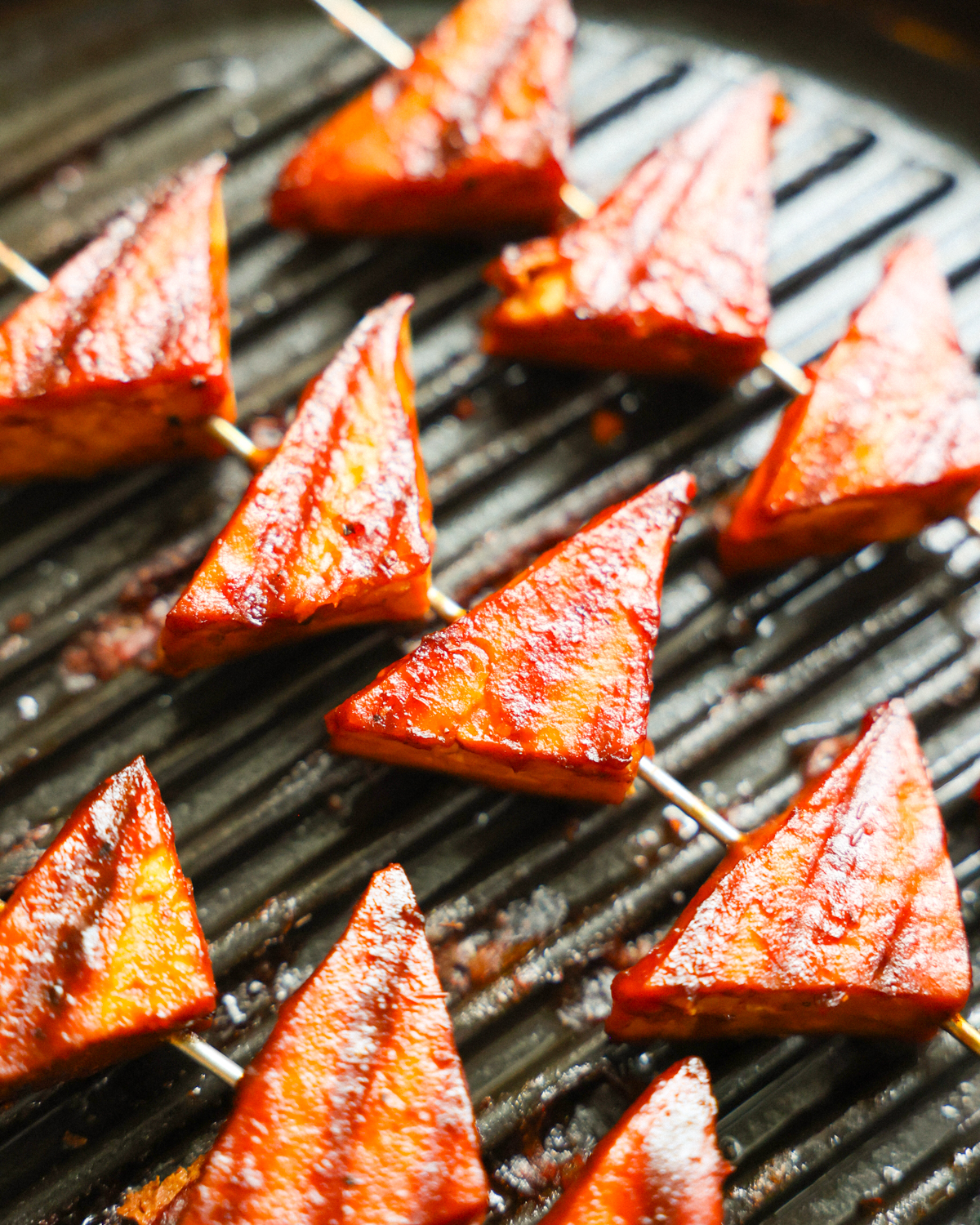 close up of bbq tofu on grill pan