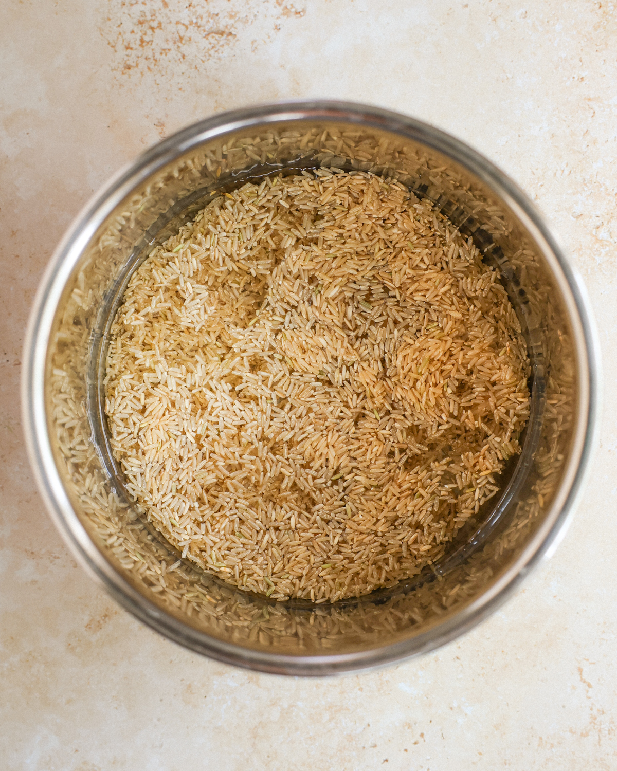 rice and water in instant pot before cooking