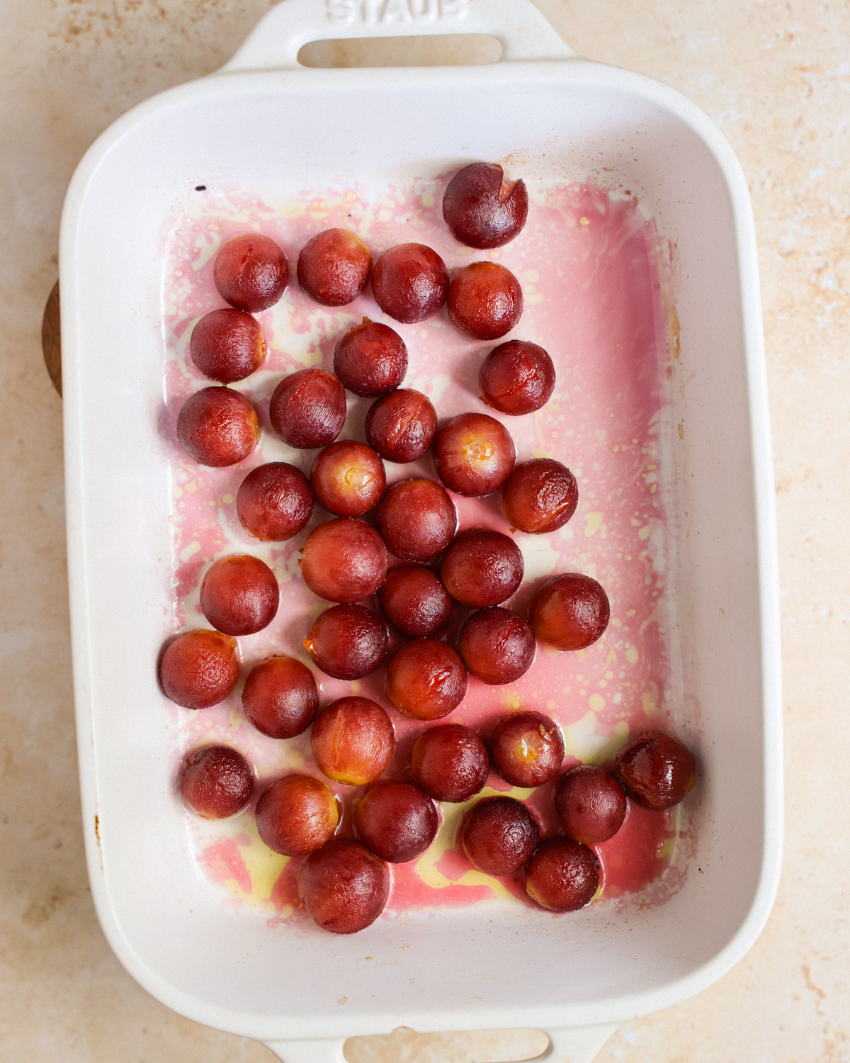 roasted grapes in baking dish overhead
