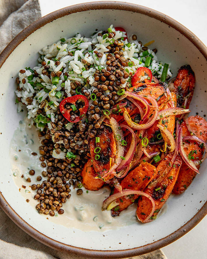 An overhead shot of the plant based rd's roasted lentil and carrot bowls.