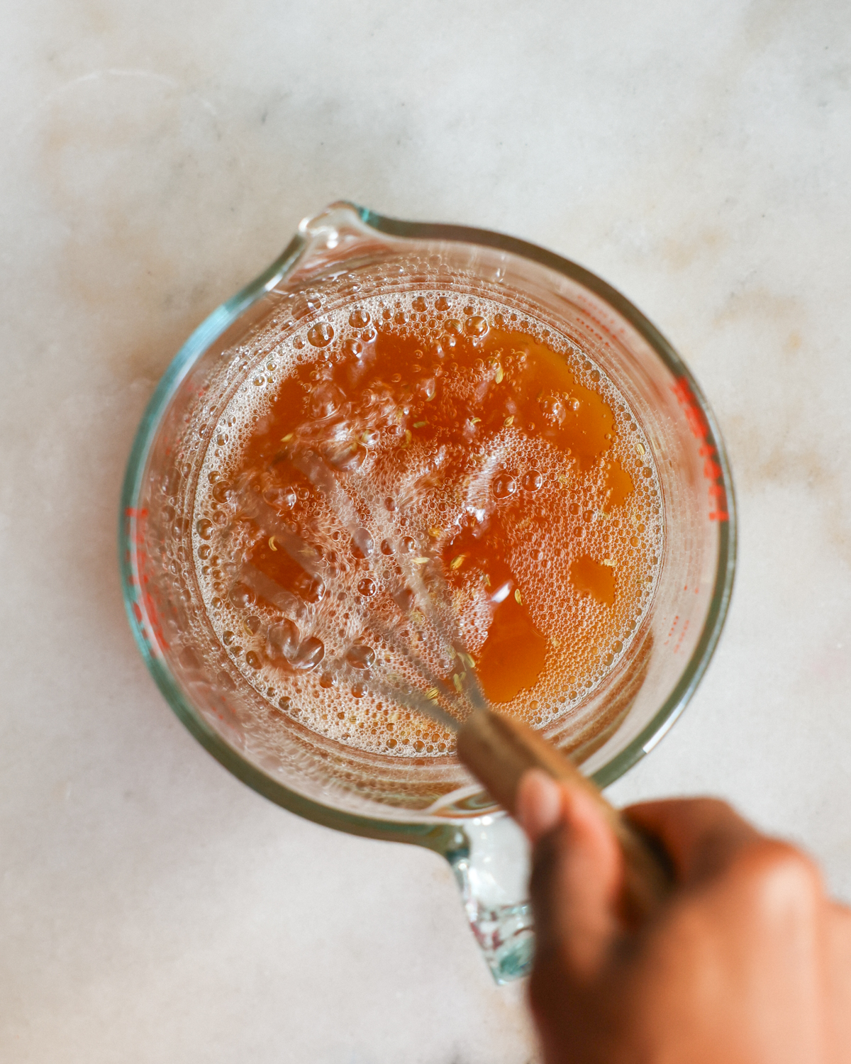 whisking the pickling liquid ingredients