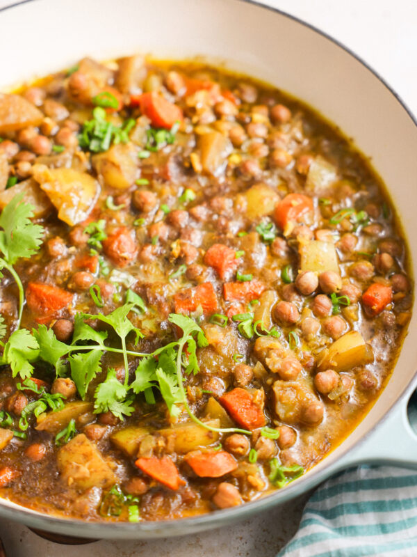 A close-up shot of a large pot of Jamaican chickpea curry.