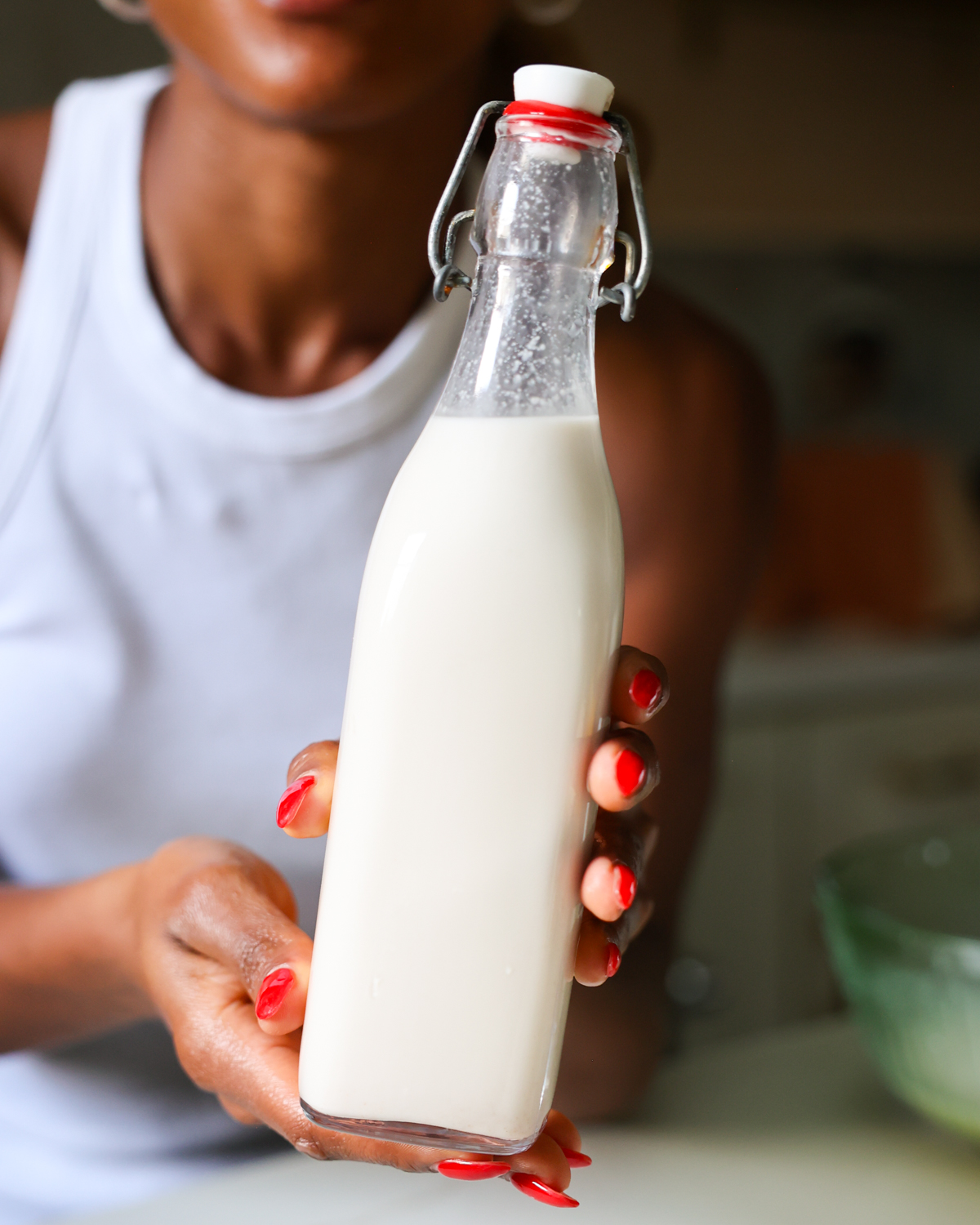 jenne holding jar of milk