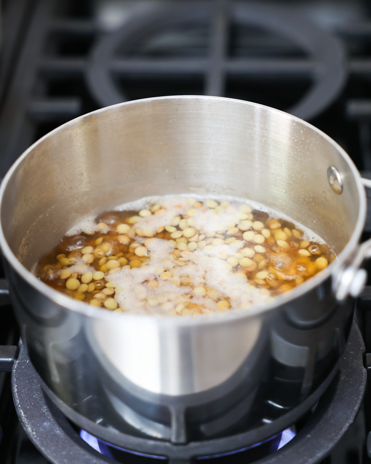simmering lentils in pot