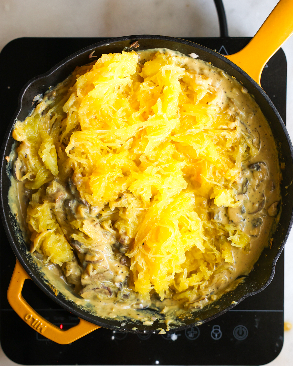 spaghetti squash added to skillet