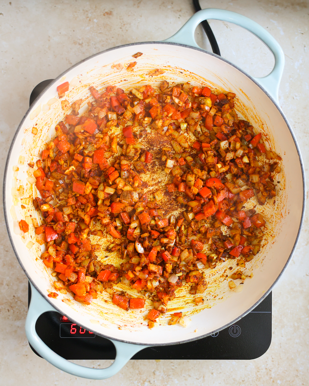 overhead spices and aromatics in pan