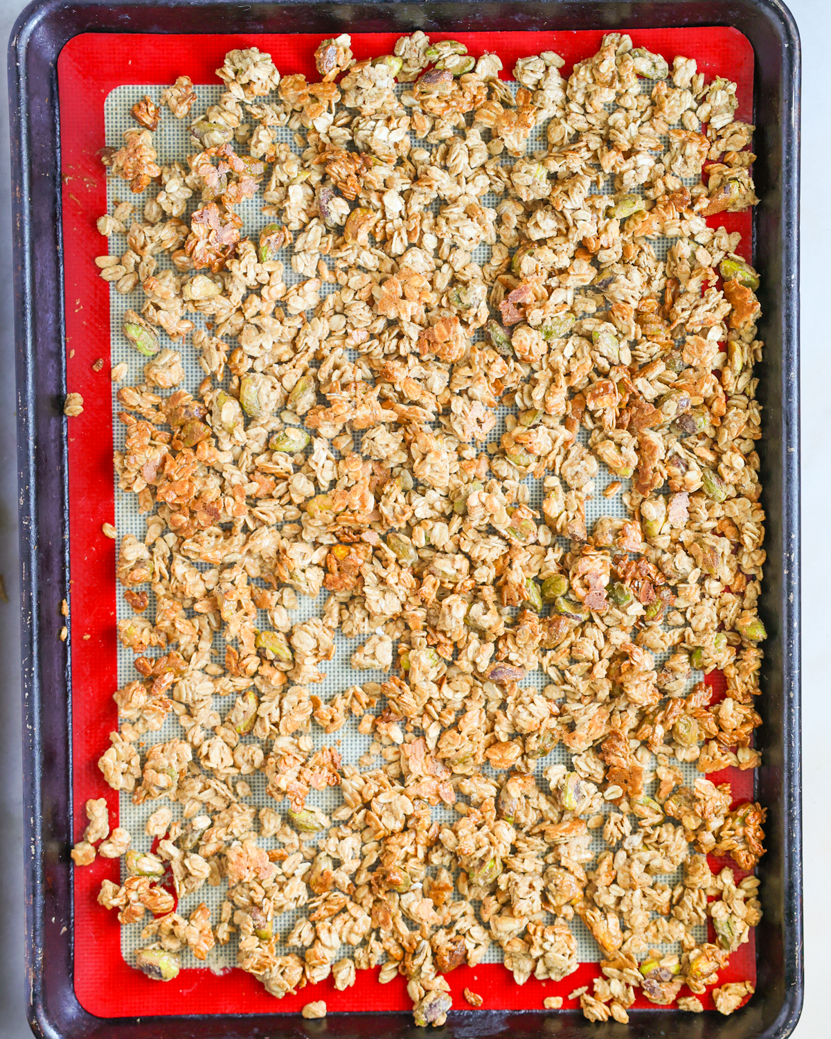 overhead tahini granola on baking sheet