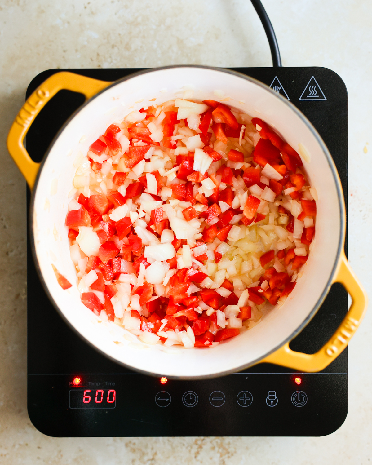 overhead sauteing aromatics in pot