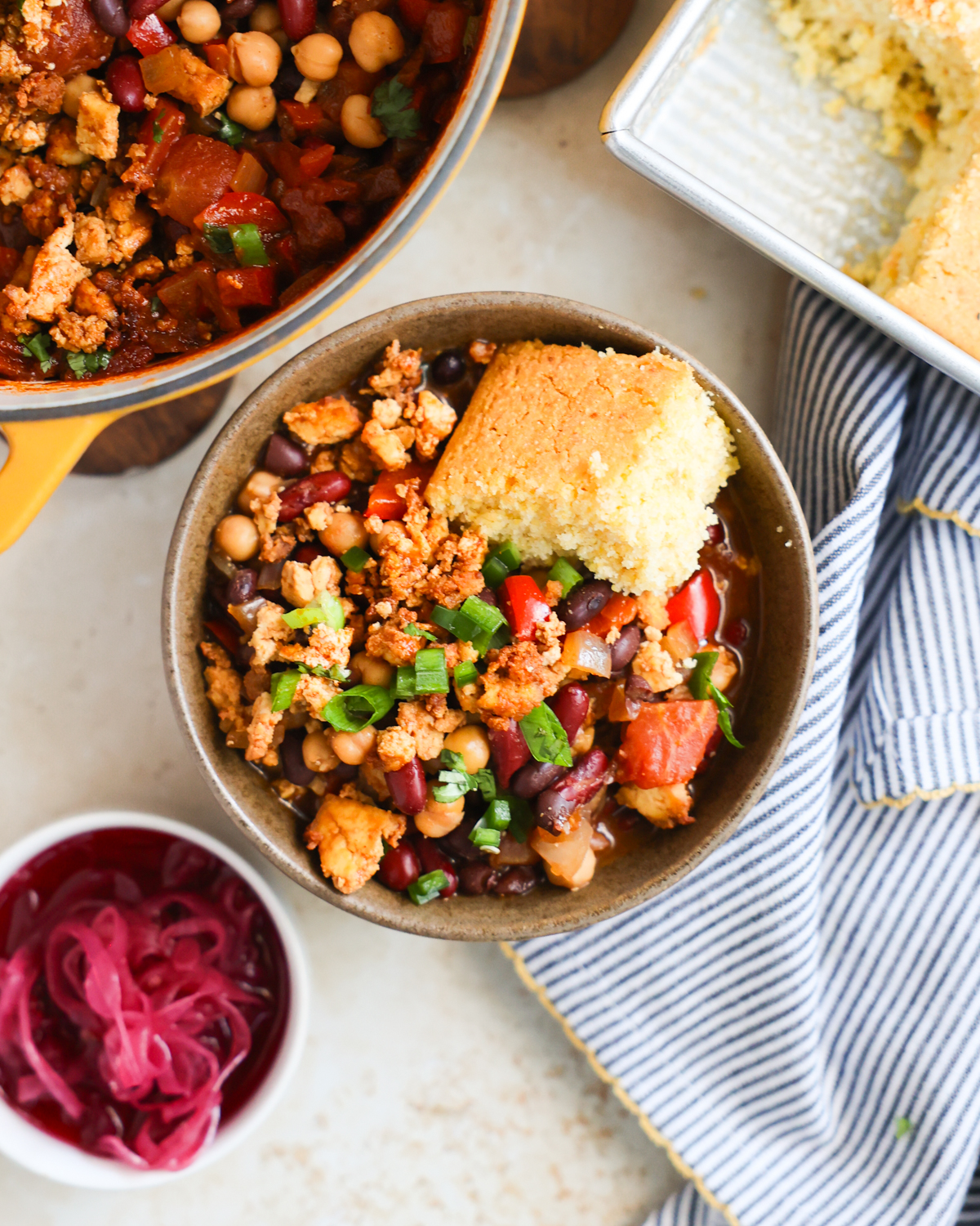 chili and cornbread in a bowl