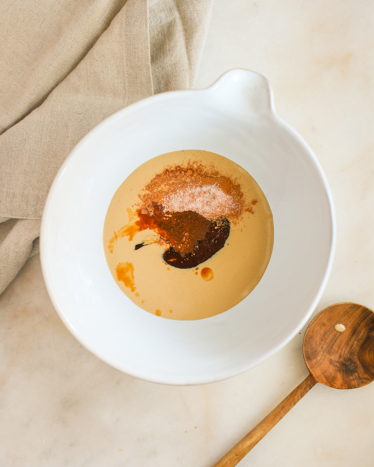 tahini and wet ingredients in mixing bowl