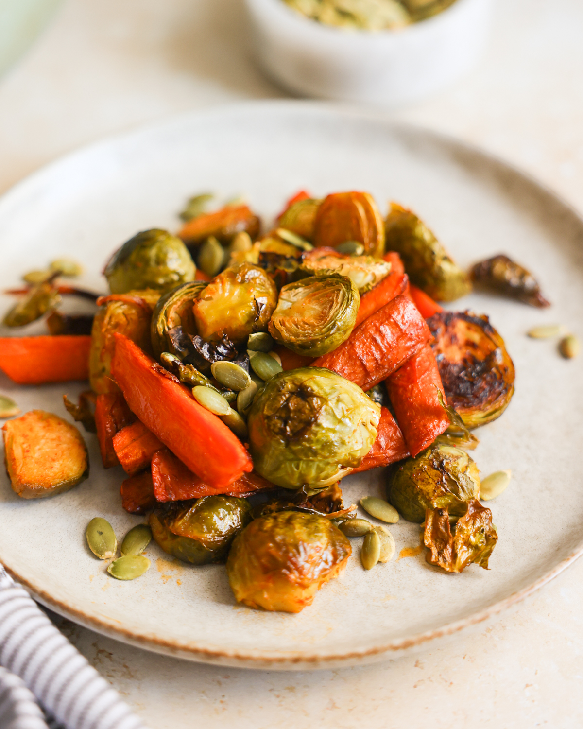 plate of brussels sprouts and carrots