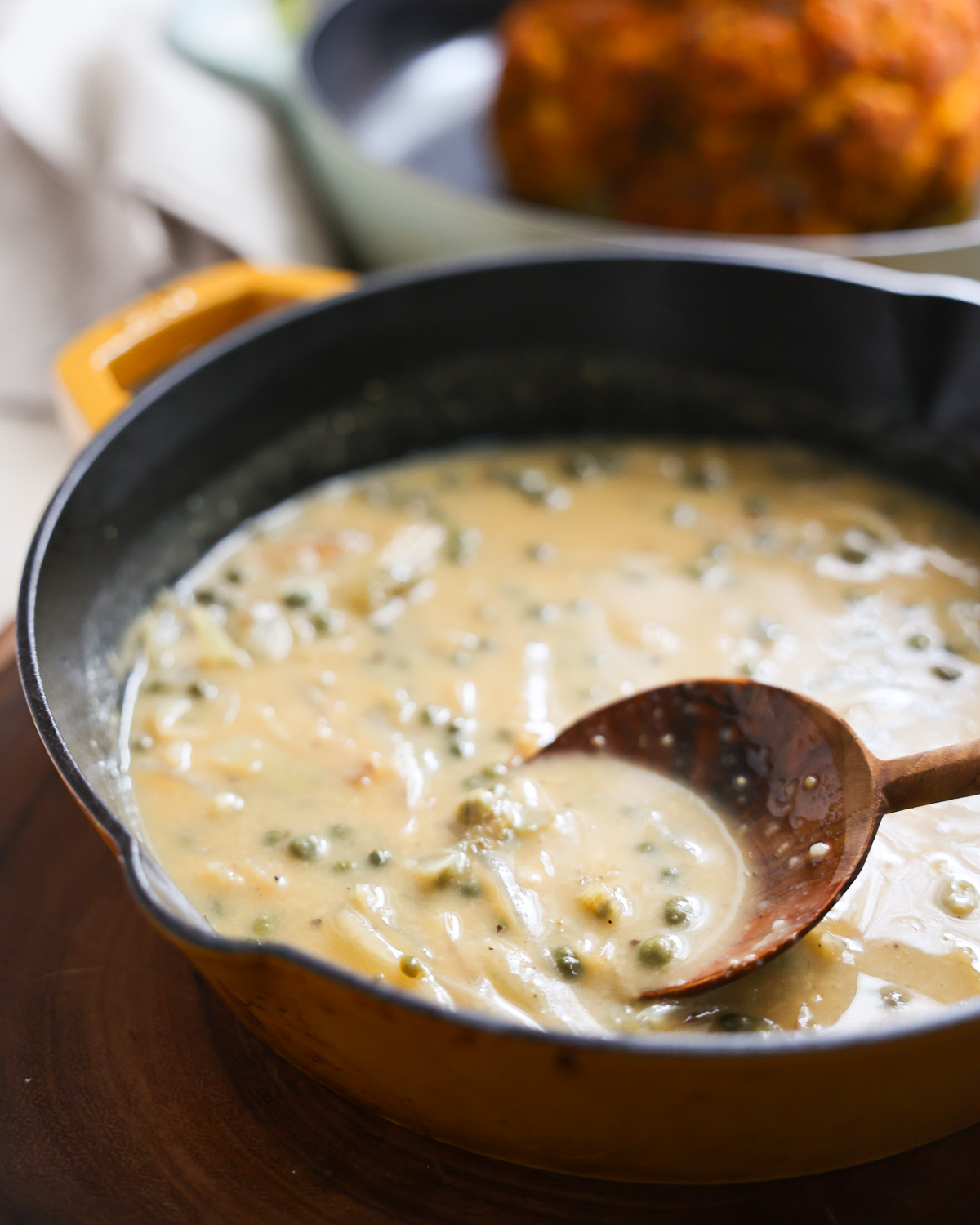 close up of piccata sauce in pan