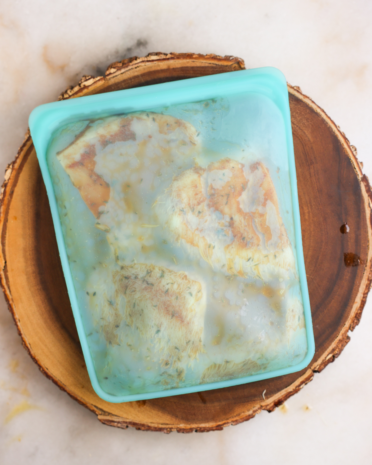 Mushrooms marinating in a zipper bag.