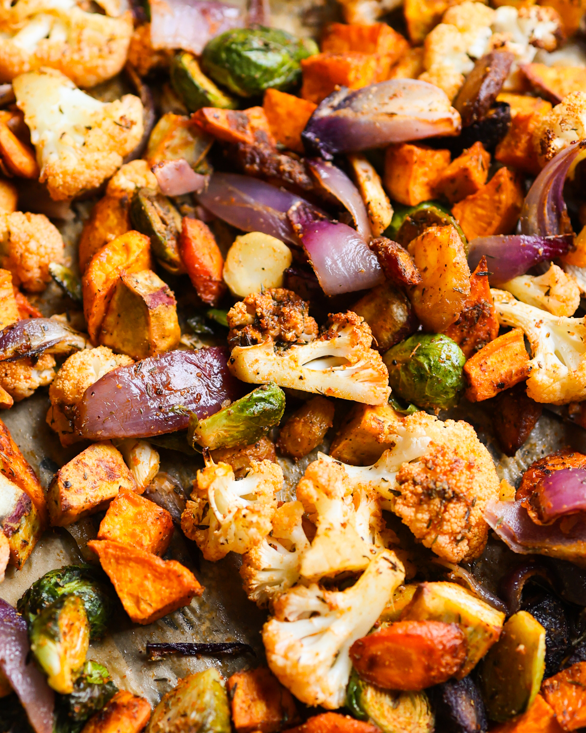 Roasted vegetables on a baking pan. 