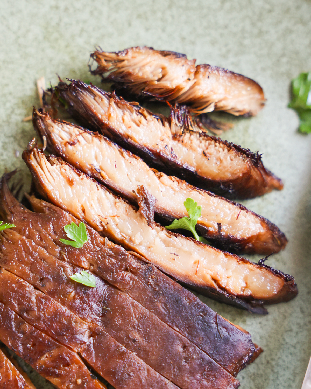 Sliced lions mane mushroom steaks. 