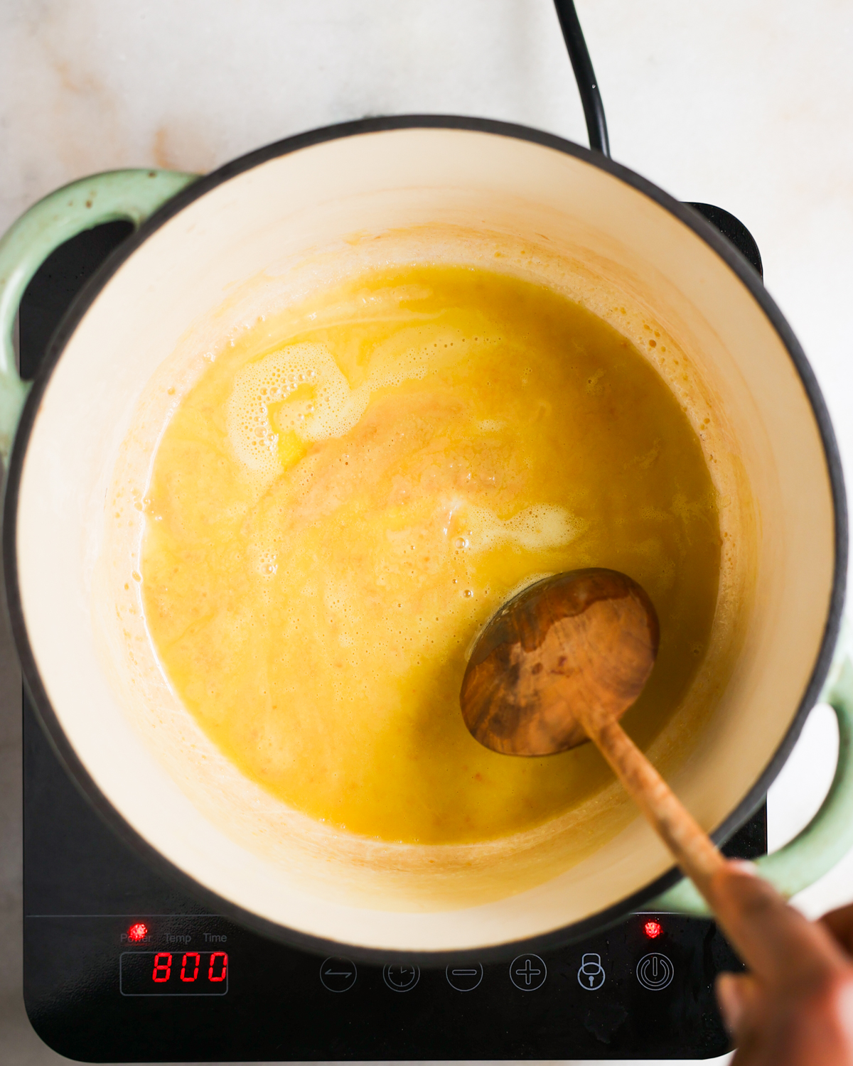 stirring roux in pot