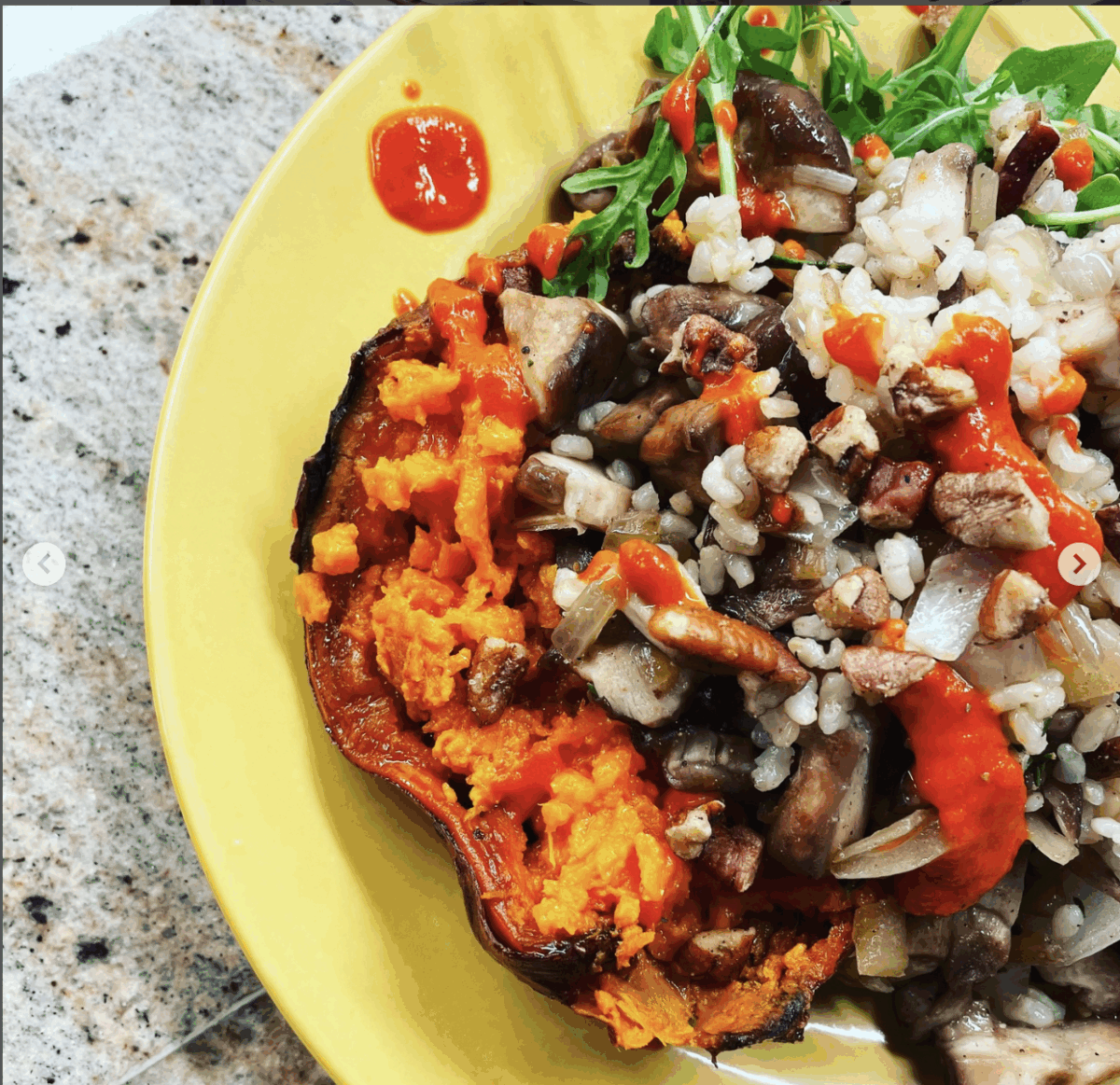 Stuffed sweet potatoes on a plate.