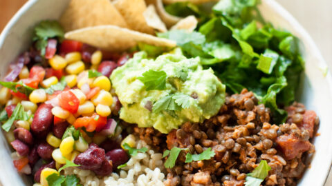 Vegan burrito bowl on table.