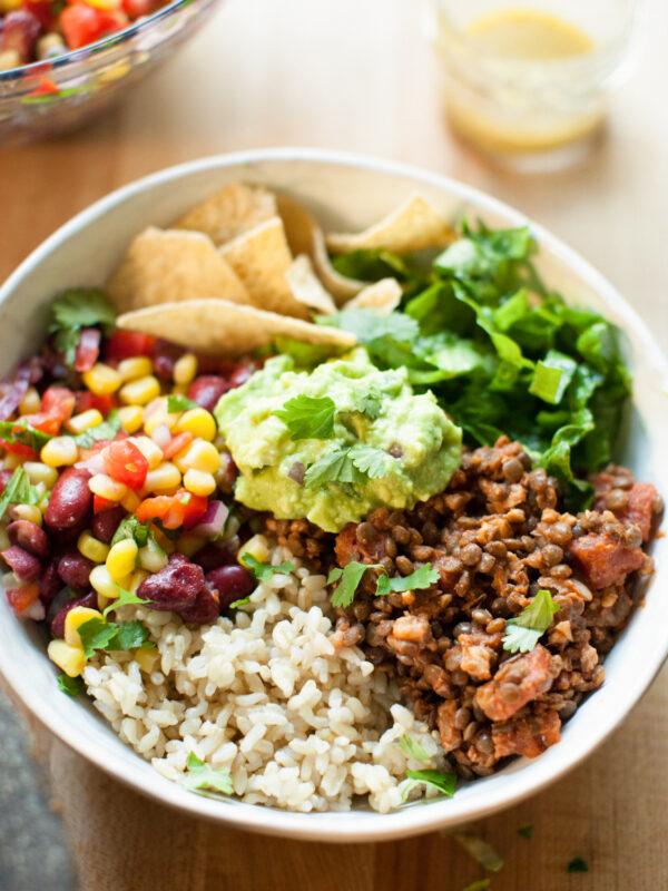 Vegan burrito bowl on table.