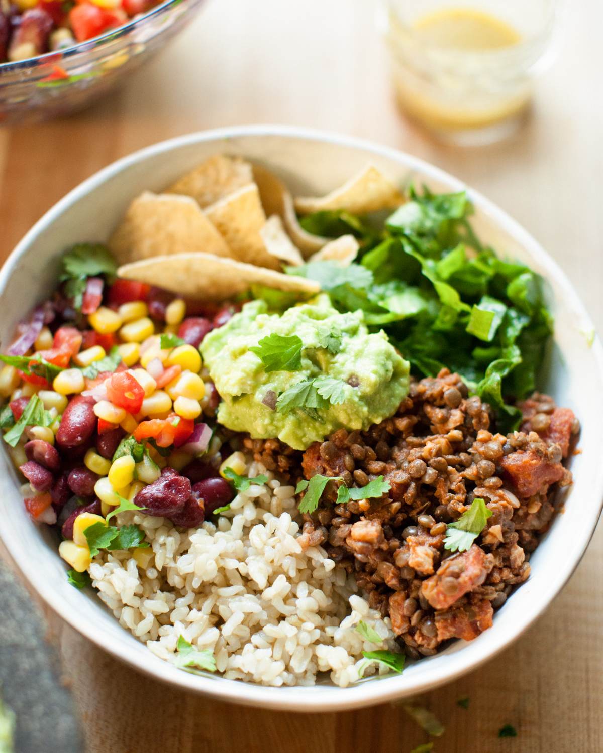 Vegan burrito bowl on table.