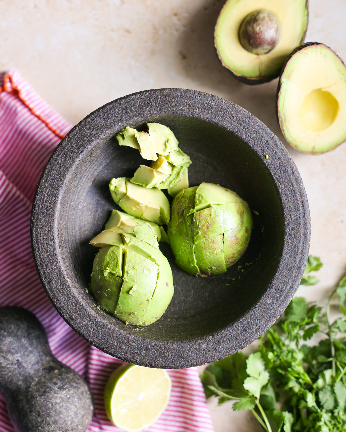 Avocado in a mortar bowl.