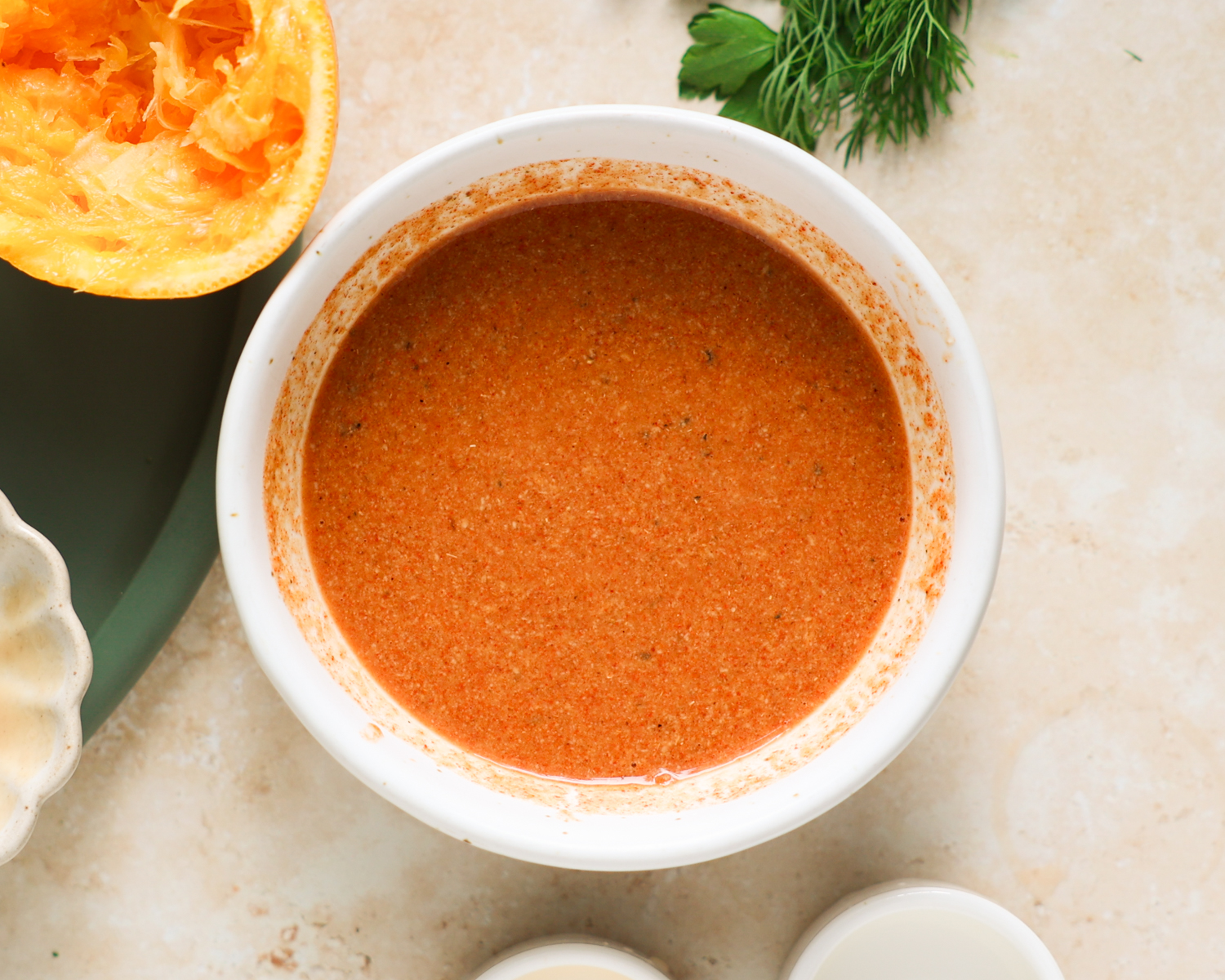 Tahini dressing in a bowl.