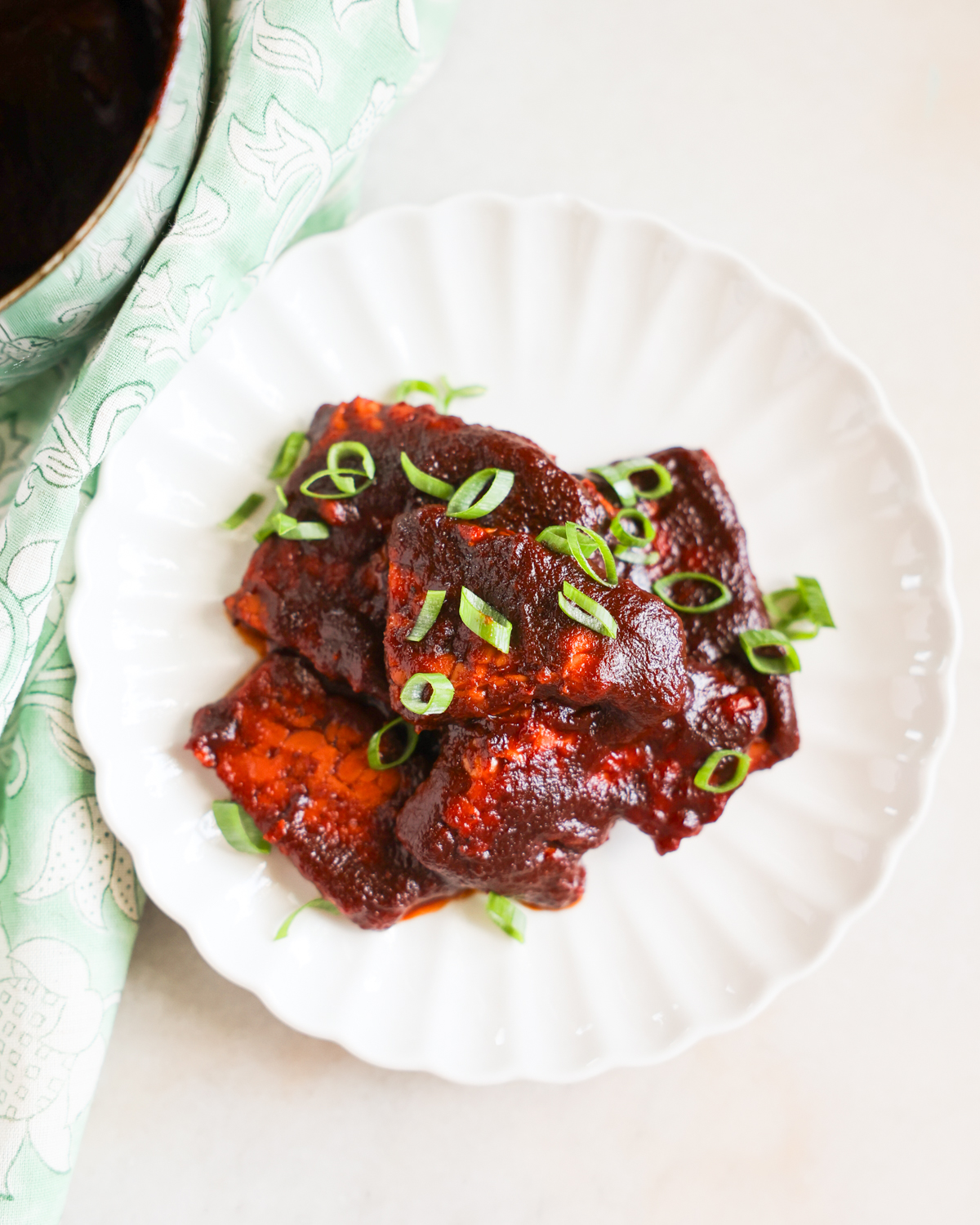 BBQ tempeh on plate.