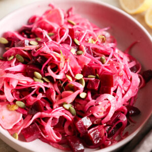 Crispy and pink fennel salad on plate.