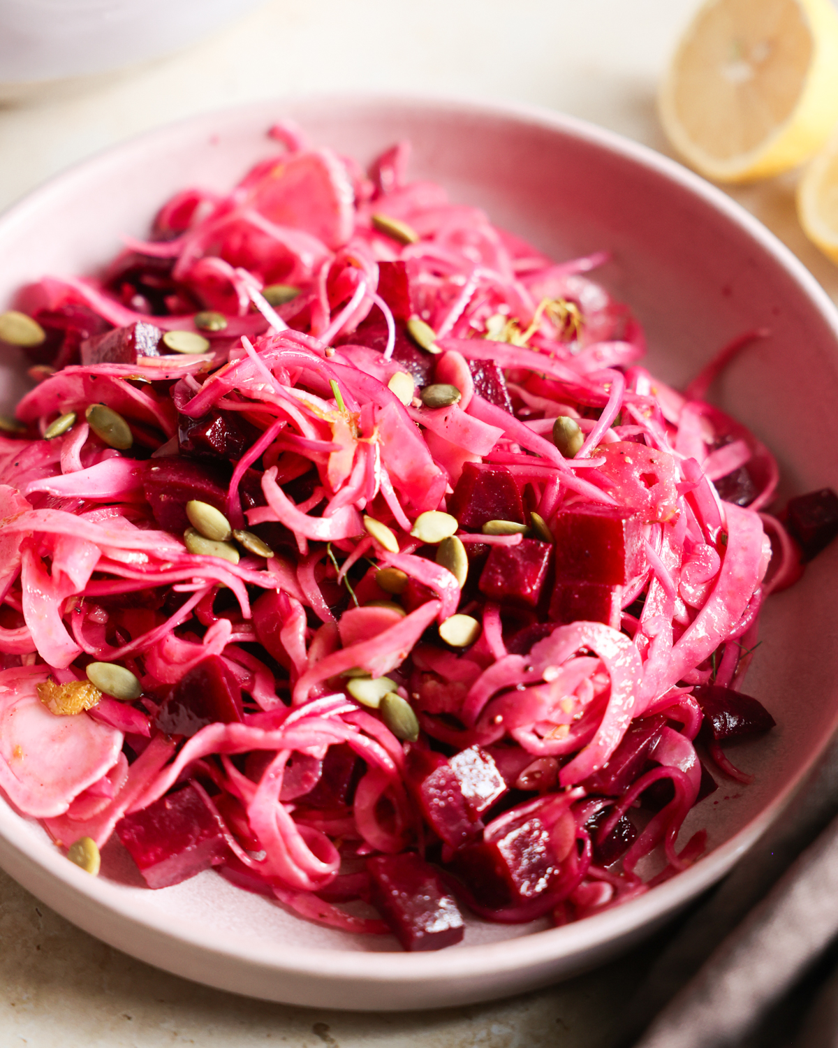 Crispy and pink fennel salad on plate.