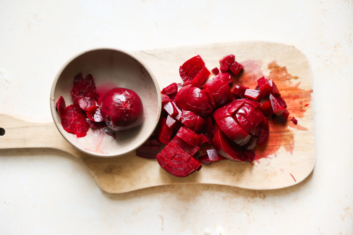 Diced beets on a cutting board.